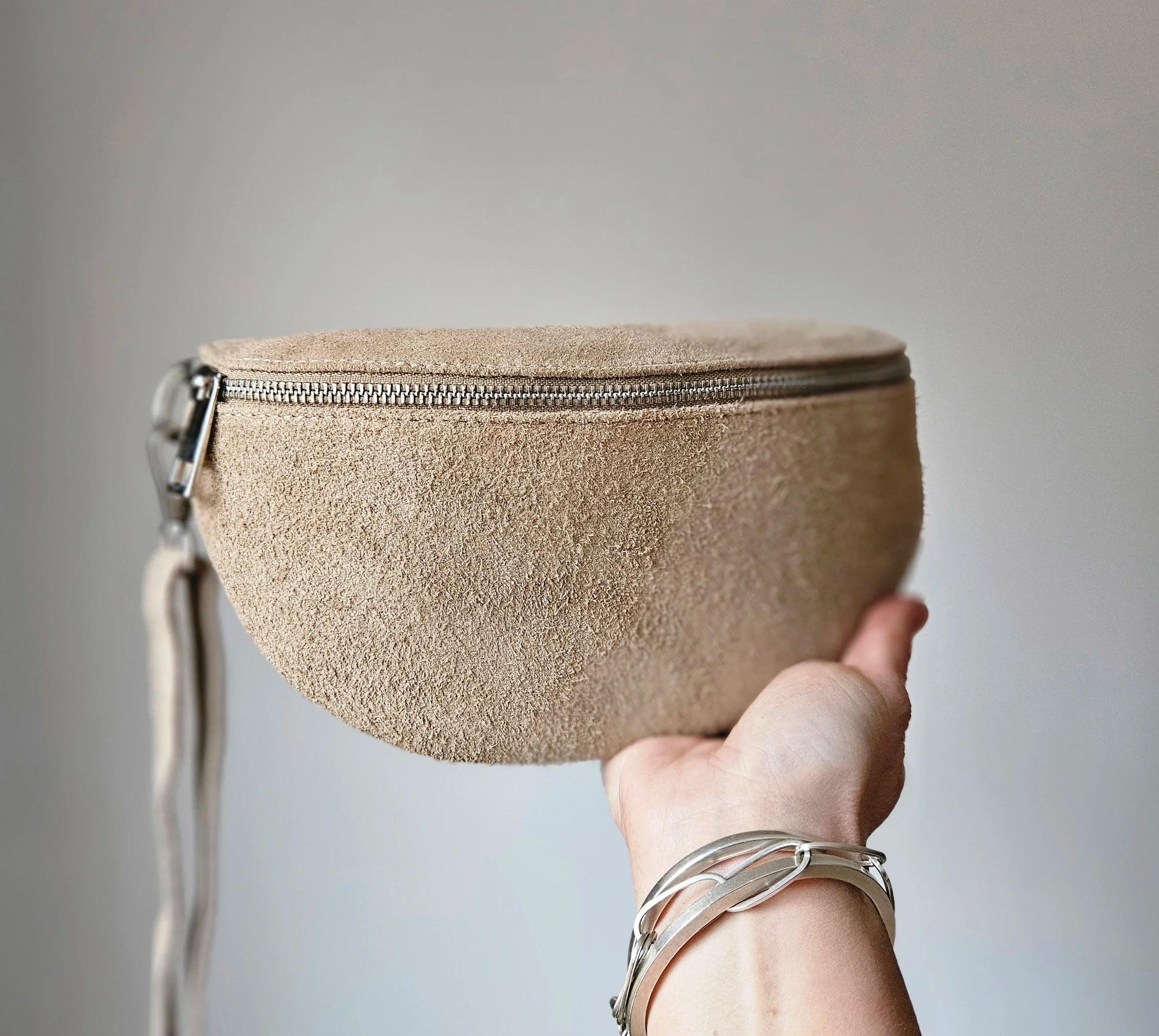 Suede sling bag
