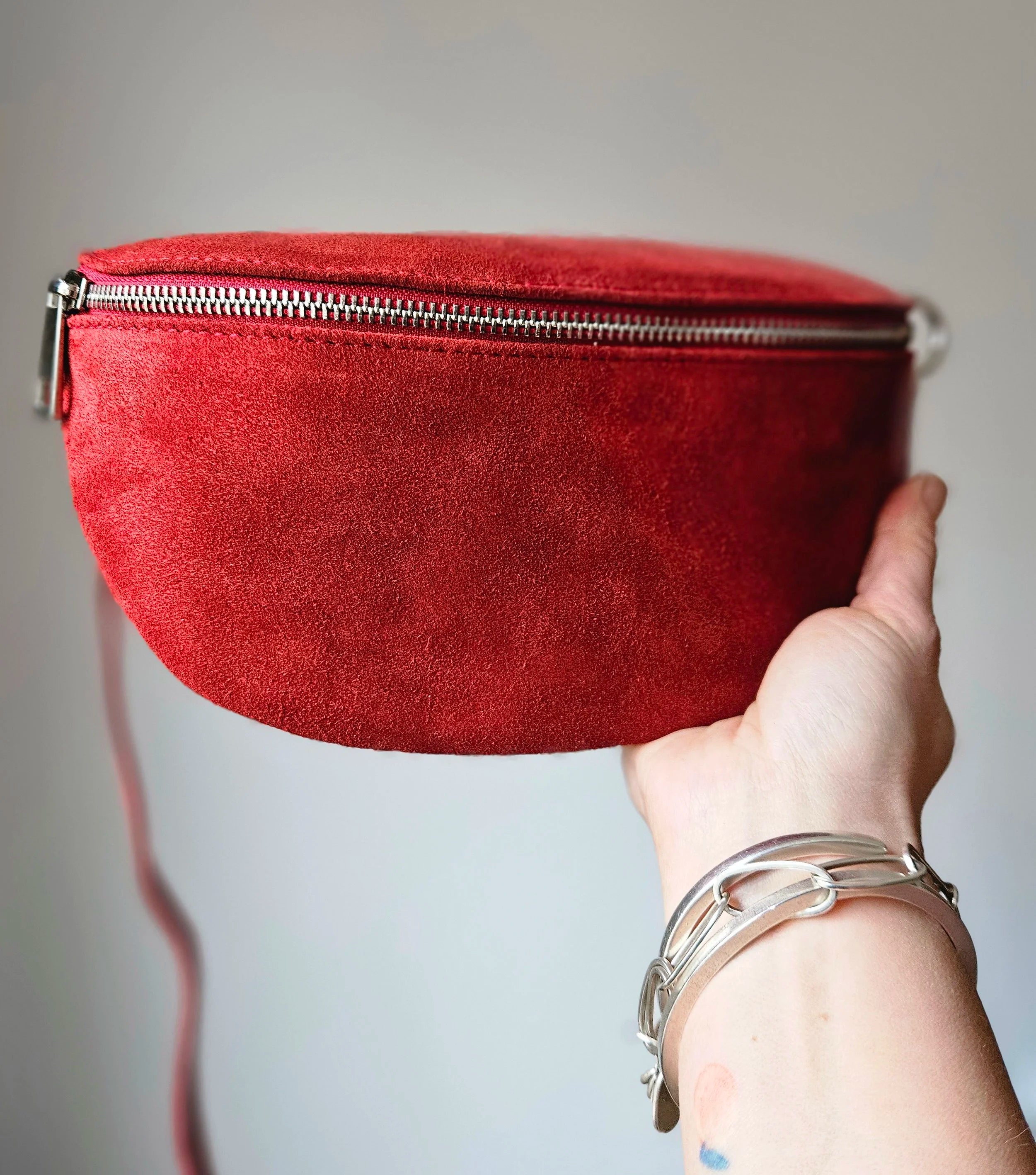 Suede sling bag