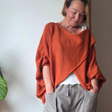 The cross front jumper from SoSatsuma in rust.